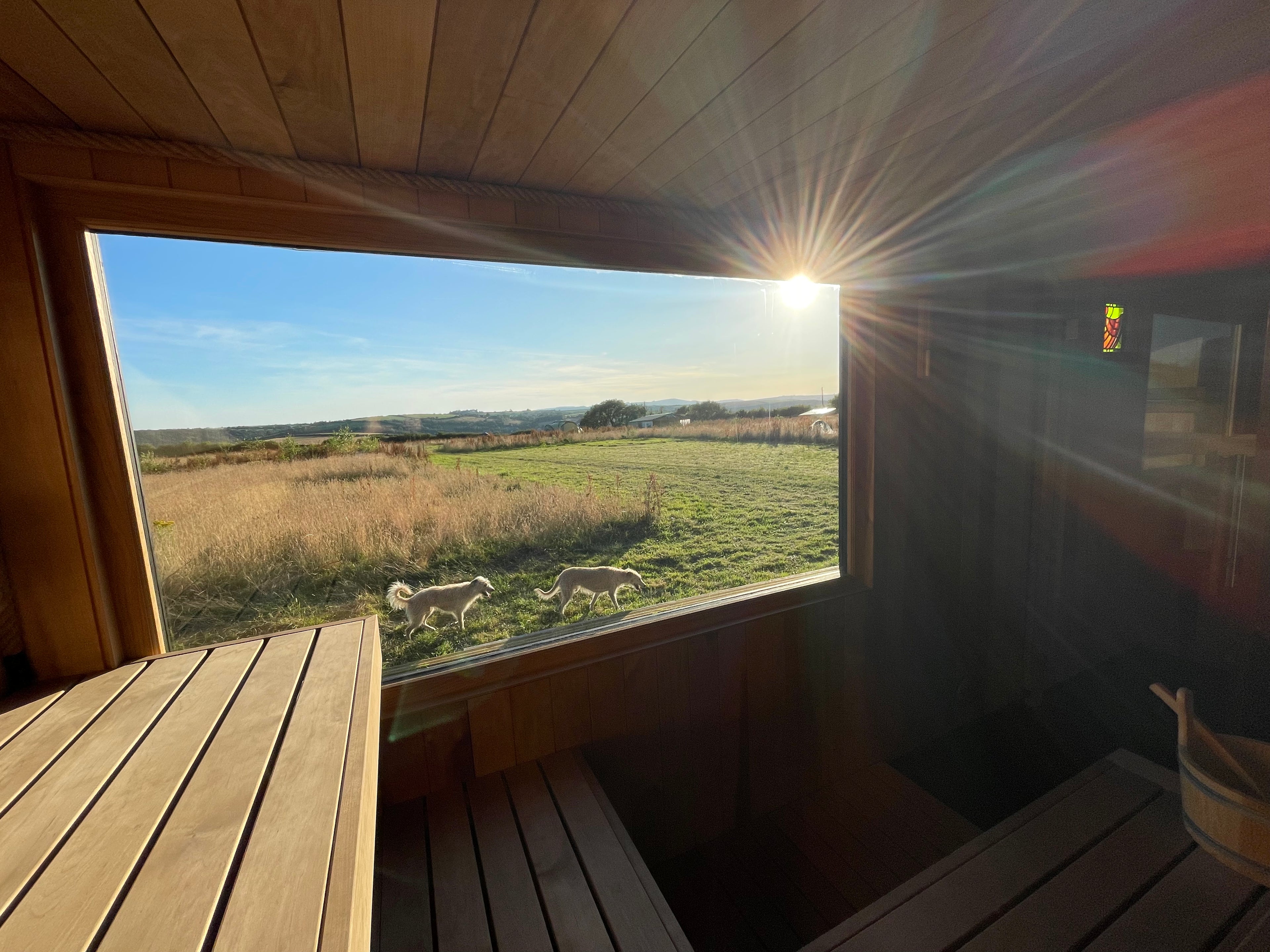 Outdoor wood-fired sauna at regenerative farm in Cornwall